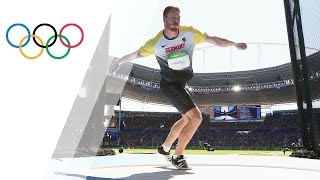 Germanys Harting wins Discus gold [upl. by Ainod]