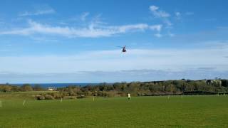 Coastguard Helicopter 999 at Craster Northumberland [upl. by Iinde549]