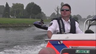 FLIKKENDAG 2014 VAREN MET SNELLE POLITIEBOOT OVER DE MAAS [upl. by Sebastian69]