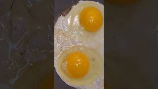 Double egg 🍳🍳flip over easy cookingchannel eggs overeasy howto [upl. by Aileahcim]