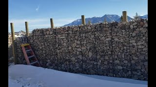 Step 10 building gabion basket walls for a Walipini style pit greenhouse [upl. by Umeh]