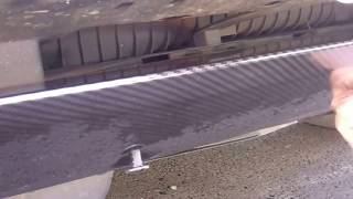 How to remove front tow eye recovery hook cover on Range Rover Sport 2010 [upl. by Dasie]