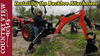 Getting the tractor ready to dig some trench Mounting the Backhoe attachment on the TYM 2515 [upl. by Oliy756]