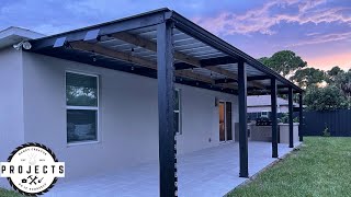 FINALLY INSTALLING A ROOF ON OUR DIY ATTACHED MODERN PERGOLA  HOW TO INSTALL METAL ROOF [upl. by Anialed]