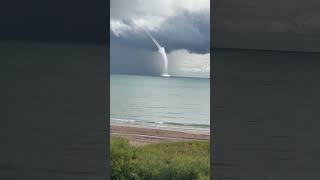 Impressive Waterspout Swirls Over Lake Michigan [upl. by Aicener]