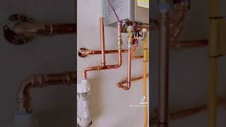 Installing a new tankless water heater Rinnai [upl. by Udale]