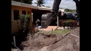 Backhoe in Pompano doing a sewer [upl. by Aseiram615]