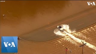 Boat Speeds Over Flooded Highway in Oregon [upl. by Eissahc]