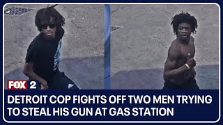 Detroit cop fights off two men trying to steal his gun at gas station [upl. by Calabresi]