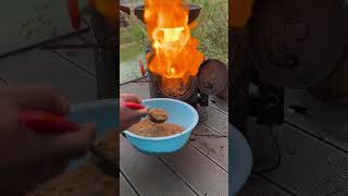 The fire burning sawdust is very big How to do it woodstove outdoorstove cookingstove bbq [upl. by Frere729]