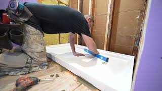 How To Install A Shower Pan Base And Drain  FAST And EASY [upl. by Ahserkal]