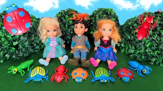 Searching for bugs  Elsa amp Anna toddlers  Barbie dolls  fun outside [upl. by Yllut902]