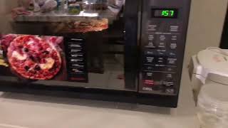 How to cookreheat pizza in sharp microwave oven shorts pizza microwaveoven sharp julies [upl. by Eidaj]