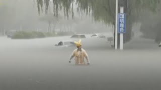 Torrential rain batters central Chinas Zhengzhou City [upl. by Elleirua]