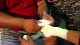 Basic fundamentals of wrapping hands in Boxing and MMA by UFC Cutman Ted Lucio [upl. by Eimmaj]