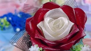 Making ribbon rose  Satin Ribbon flowers [upl. by Einaffets214]