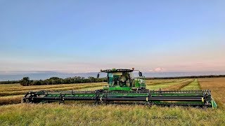 Swathing Canadian Canola with a John Deere W235 [upl. by Stevena]