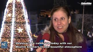 Palestinians light up Christmas tree in Ramallah [upl. by Eeleak]