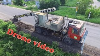 Drone video Tatra 815 UDS114 digging roadside [upl. by Kellda]