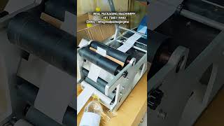 ROUND STICKER LABELING MACHINE  STICKER APPLICATOR MACHINE labelingmachine [upl. by Ainezey]