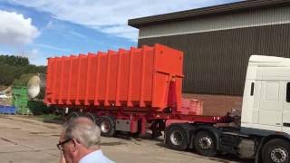 Loading a 9m compactor container onto a HTS3090 hooklift semitrailer [upl. by Oruhtra]