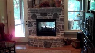 Sitting room with built in bookcases two sided fireplace and special trey ceiling [upl. by Pruchno]