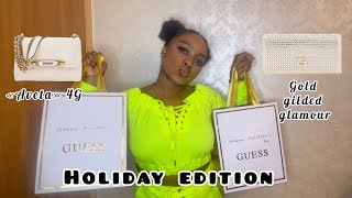 Unboxing amp reviewing official guess aveta bag with 4g logo amp gold gilded glamour crossbody clutch [upl. by Yesrod221]