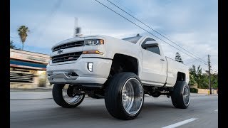 Lifted Silverado on 26x14 Intro Billets [upl. by Ellitnahc]