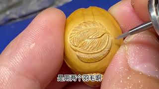 橄榄核雕刻金翅大鹏雕Olive Core Carving Golden Winged Dapeng Carvinghand carved [upl. by Naeloj663]