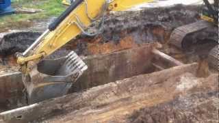 Caterpillar 336E excavator digging for storm pipe [upl. by Norrek]