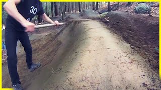 Rebuilding A Berm and Moving More Rocks On Our Pump Track [upl. by Ahseekat404]