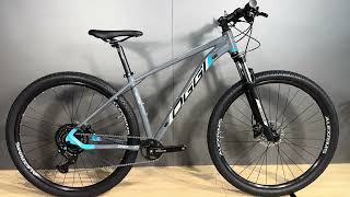 Bicicleta Oggi Big Wheel 70 2024 Shimano Cues GrafiteAzul [upl. by Suqram801]