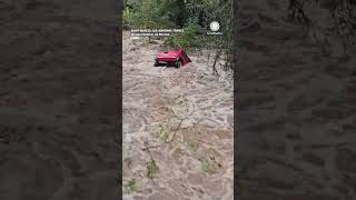 Mini Cooper Bobs Downstream During France Flooding [upl. by Okiron465]