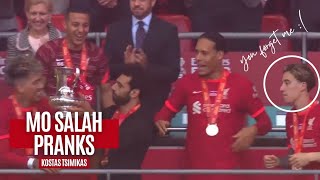 Mo Salah pranks Kostas Tsimikas 🤣 Liverpool FA Cup Celebration  TROPHY LIFT Moments [upl. by Munster]