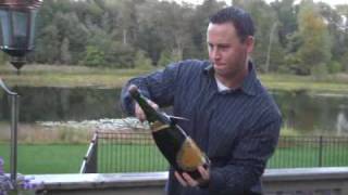 Sabering a magnum of Jean Laurent Champagne [upl. by Nauqet]