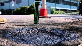 How to repair a pothole with cold lay tarmac [upl. by Anilag]