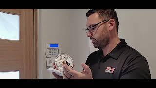 Enrolling A PG4936PG4916 Wireless Smoke Detector On DSC Neo [upl. by Ennairak]