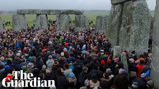 Record crowd celebrates winter solstice at Stonehenge [upl. by Matthus]