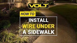 How to Run Wire Under a Sidewalk for Landscape Lighting [upl. by Poucher245]