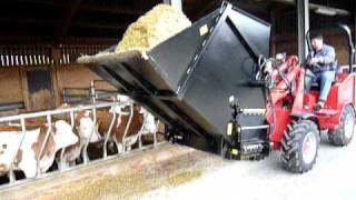 Schaeffer 2027 pivot steer yard loader with silage dispenser [upl. by Irena]