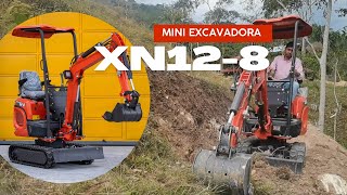 Mini excavadora XN128 Rhinoceros haciendo un camino [upl. by Araj997]