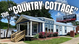 This 18 wide mobile home id FULL of rustic country CHARM Prefab House Tour [upl. by Yenittirb653]