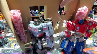 SDCC 2024 Transformers Fractured Friendship Gladiator Megatron vs Security Officer Orion Pax [upl. by Yllrebmik]