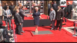 Helen Mirren immortalized in Hollywood hand and foot ceremony [upl. by Robbert]