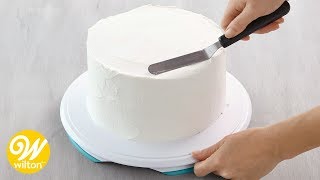 How to Crumb Coat and Ice a Cake Using a Spatula  Wilton [upl. by Benedetto]