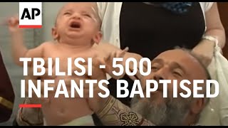 500 infants baptised in mass Orthodox ceremony [upl. by Deborath36]