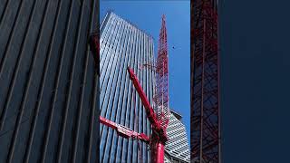 Lifting an air conditioner to a 180 meter building Good tools and machinery make work easy [upl. by Ettenotna]