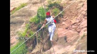 Chinese acrobat survives tightrope fall [upl. by Gayelord]