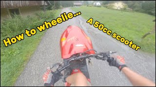 How to wheelie a 50cc scooter tutorial [upl. by Nicholson75]