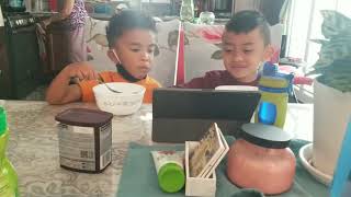 6yo Jude amp cousin Nate eating cereals together while playing game on the tablet [upl. by Elicul147]